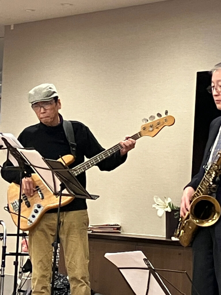 大宮バンドのギター、サックス奏者